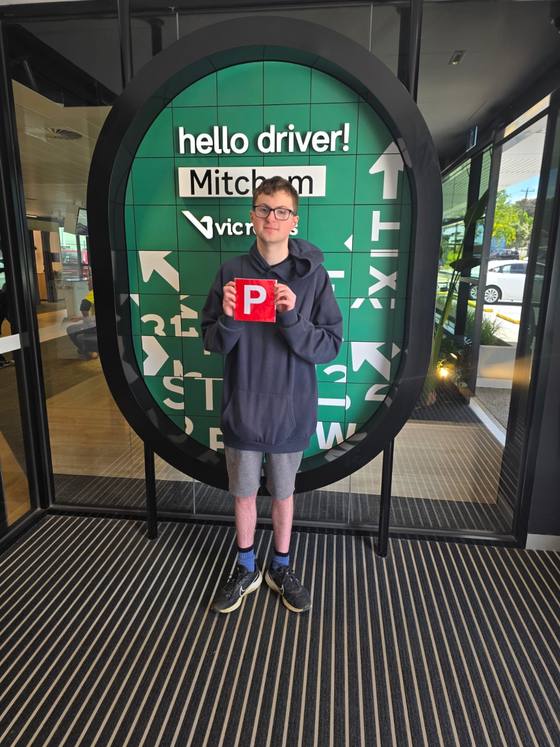 Pathfinder Driving School student celebrating their driving test pass at VicRoads Mitcham (Ringwood)