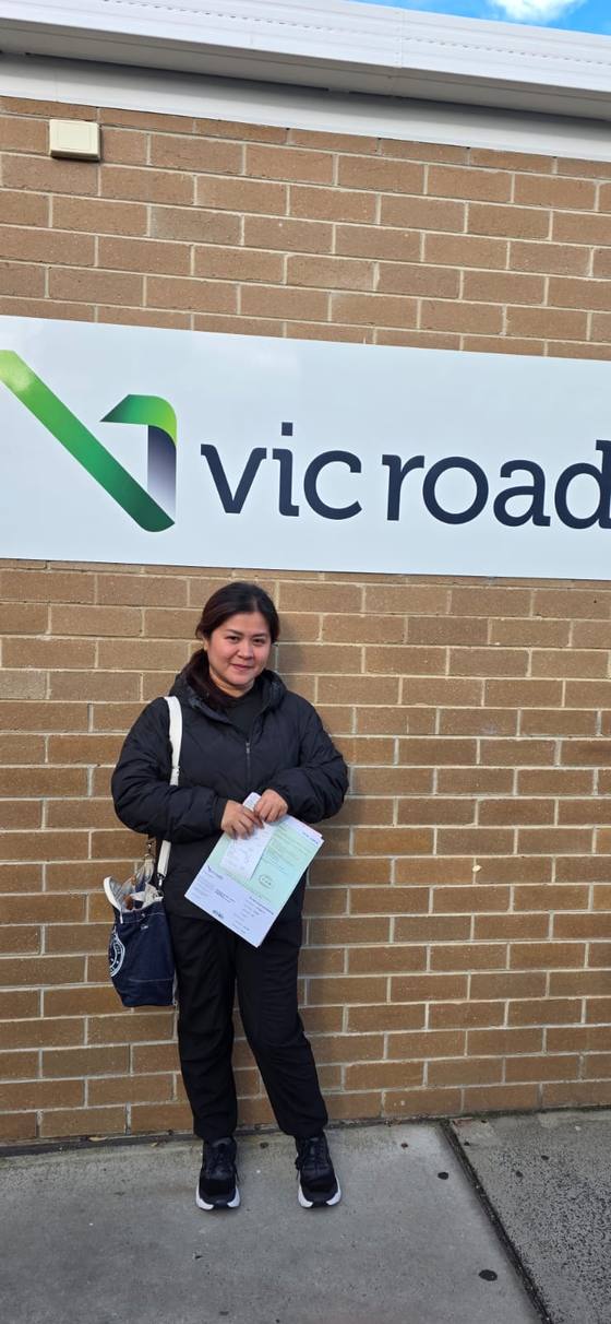 Pathfinder Driving School student celebrating their driving test pass at VicRoads Mitcham (Ringwood)