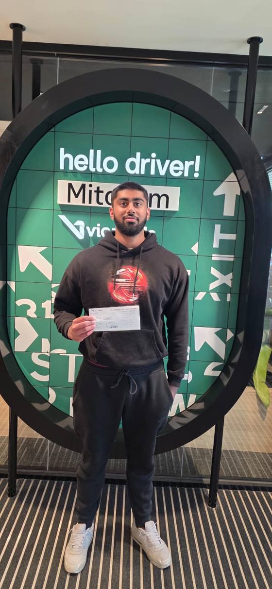 Pathfinder Driving School student celebrating their driving test pass at VicRoads Mitcham (Ringwood)