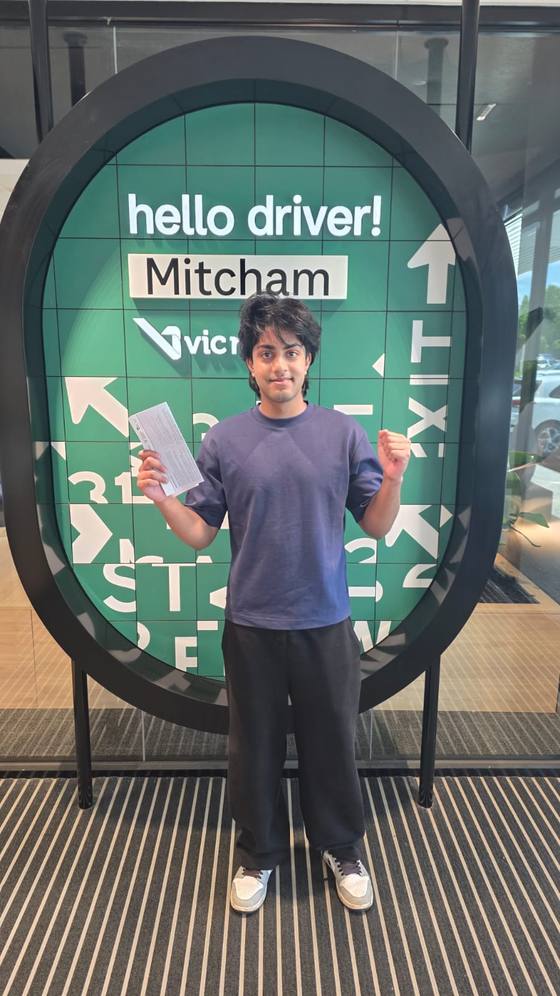 Pathfinder Driving School student celebrating their driving test pass at VicRoads Mitcham (Ringwood)
